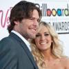 Photo: Mike Fisher and Carrie Underwood arrive at the 201